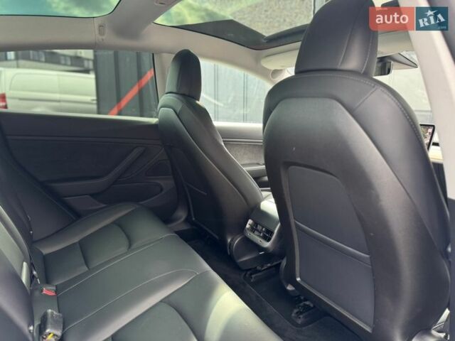 Синий Тесла Модель 3, объемом двигателя 0 л и пробегом 103 тыс. км за 15900 $, фото 42 на Automoto.ua