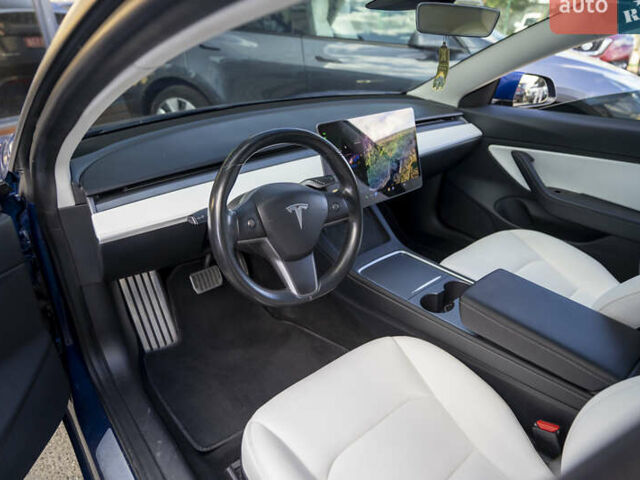 Синий Тесла Модель 3, объемом двигателя 0 л и пробегом 42 тыс. км за 18200 $, фото 12 на Automoto.ua
