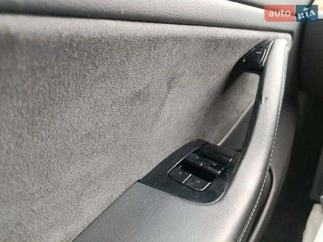 Синий Тесла Модель 3, объемом двигателя 0 л и пробегом 83 тыс. км за 12300 $, фото 24 на Automoto.ua