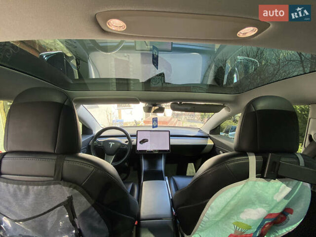 Синий Тесла Модель 3, объемом двигателя 0 л и пробегом 94 тыс. км за 15900 $, фото 21 на Automoto.ua