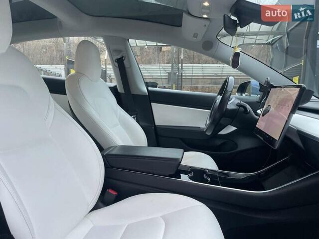 Синий Тесла Модель 3, объемом двигателя 0 л и пробегом 100 тыс. км за 16490 $, фото 21 на Automoto.ua