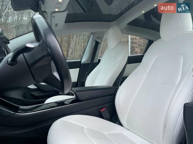 Синий Тесла Модель 3, объемом двигателя 0 л и пробегом 100 тыс. км за 16490 $, фото 14 на Automoto.ua