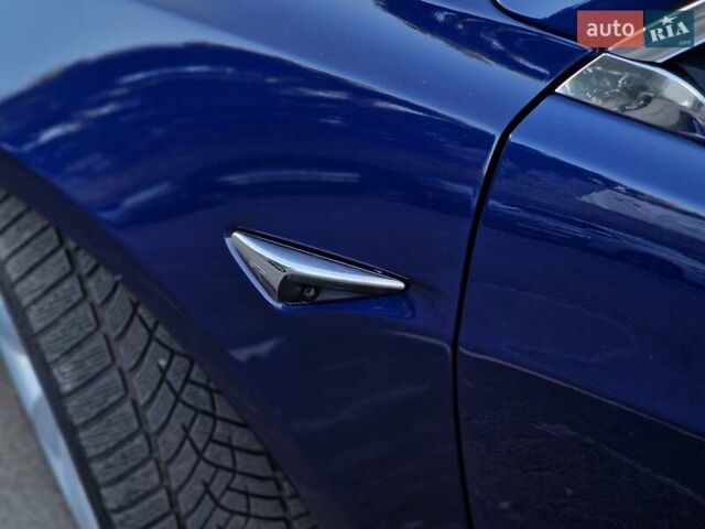 Синий Тесла Модель 3, объемом двигателя 0 л и пробегом 98 тыс. км за 19990 $, фото 19 на Automoto.ua