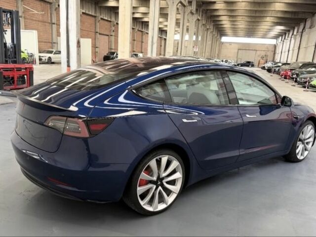 Синий Тесла Модель 3, объемом двигателя 0 л и пробегом 124 тыс. км за 13718 $, фото 3 на Automoto.ua