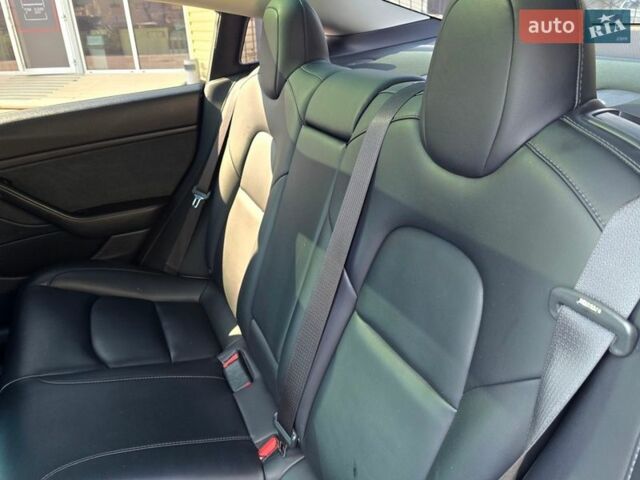 Синій Тесла Модель 3, об'ємом двигуна 0 л та пробігом 76 тис. км за 16700 $, фото 48 на Automoto.ua