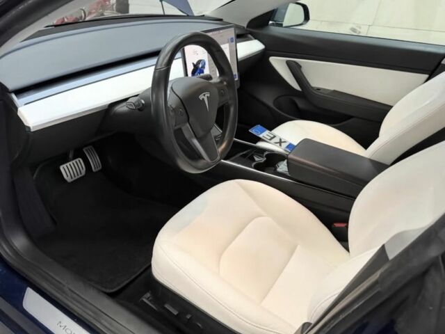 Синий Тесла Модель 3, объемом двигателя 0 л и пробегом 124 тыс. км за 13718 $, фото 5 на Automoto.ua