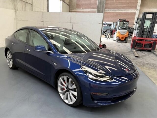 Синий Тесла Модель 3, объемом двигателя 0 л и пробегом 124 тыс. км за 13718 $, фото 1 на Automoto.ua