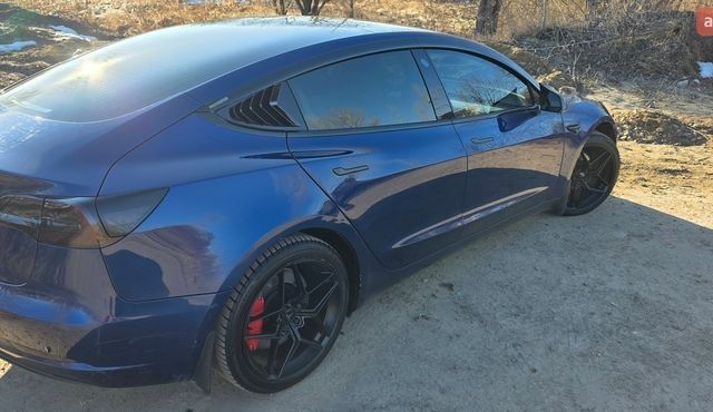 Синій Тесла Модель 3, об'ємом двигуна 0 л та пробігом 97 тис. км за 17800 $, фото 2 на Automoto.ua