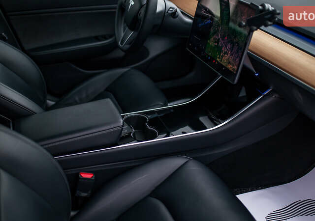 Синій Тесла Модель 3, об'ємом двигуна 0 л та пробігом 77 тис. км за 19999 $, фото 41 на Automoto.ua