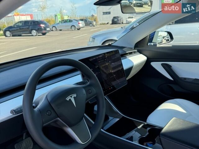 Синий Тесла Модель 3, объемом двигателя 0 л и пробегом 63 тыс. км за 16900 $, фото 18 на Automoto.ua
