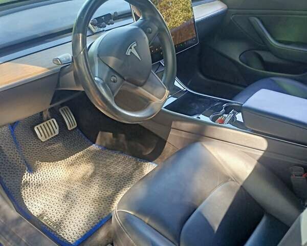Синий Тесла Модель 3, объемом двигателя 0 л и пробегом 105 тыс. км за 19900 $, фото 3 на Automoto.ua