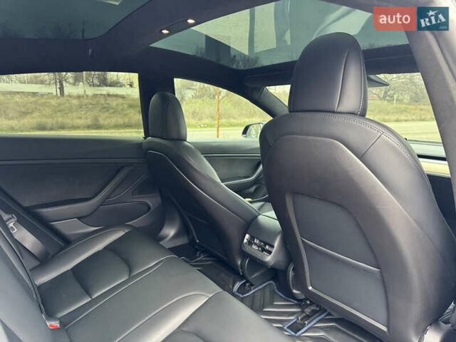 Синий Тесла Модель 3, объемом двигателя 0 л и пробегом 64 тыс. км за 19900 $, фото 24 на Automoto.ua