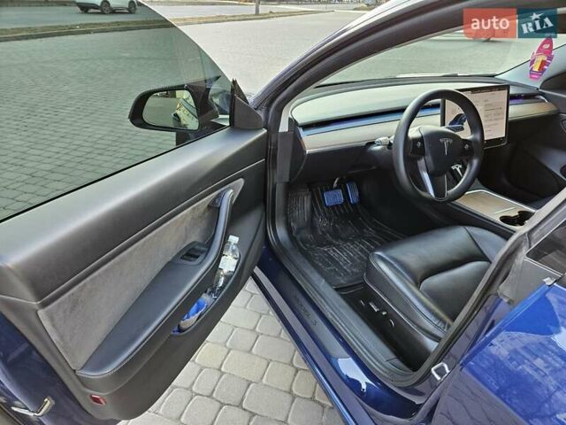 Синий Тесла Модель 3, объемом двигателя 0 л и пробегом 82 тыс. км за 21700 $, фото 20 на Automoto.ua