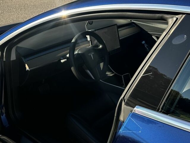 Синий Тесла Модель 3, объемом двигателя 0 л и пробегом 70 тыс. км за 23000 $, фото 2 на Automoto.ua