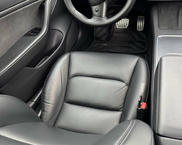 Синий Тесла Модель 3, объемом двигателя 0 л и пробегом 64 тыс. км за 19900 $, фото 30 на Automoto.ua