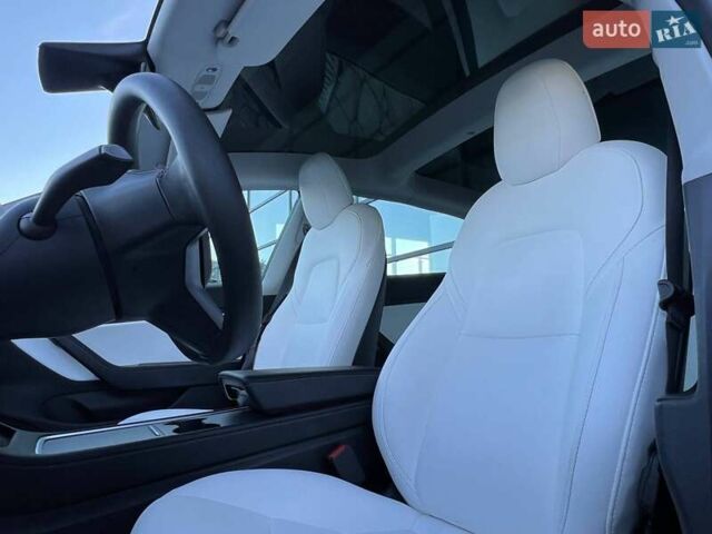 Синий Тесла Модель 3, объемом двигателя 0 л и пробегом 75 тыс. км за 21200 $, фото 16 на Automoto.ua