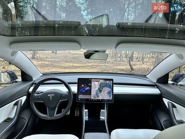 Синий Тесла Модель 3, объемом двигателя 0 л и пробегом 98 тыс. км за 19777 $, фото 25 на Automoto.ua