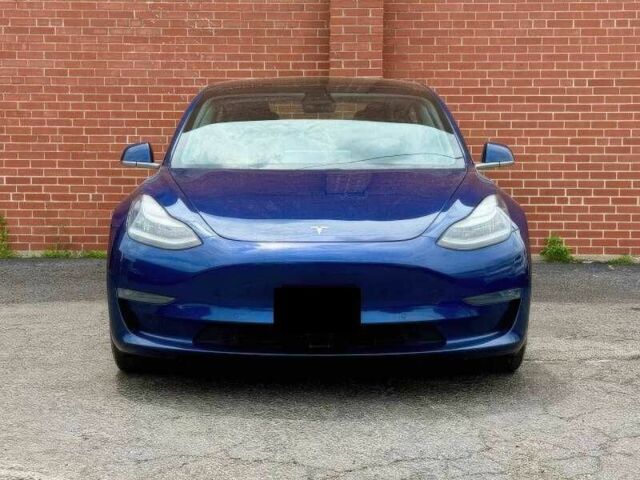 Синий Тесла Модель 3, объемом двигателя 0 л и пробегом 56 тыс. км за 13000 $, фото 1 на Automoto.ua