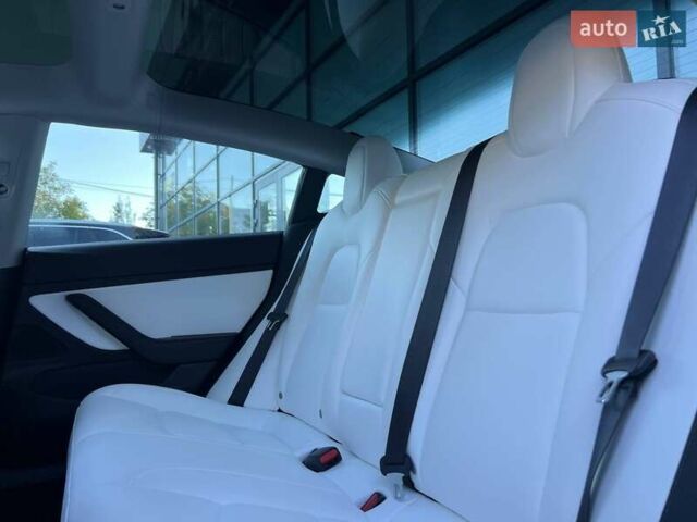 Синий Тесла Модель 3, объемом двигателя 0 л и пробегом 75 тыс. км за 21200 $, фото 14 на Automoto.ua