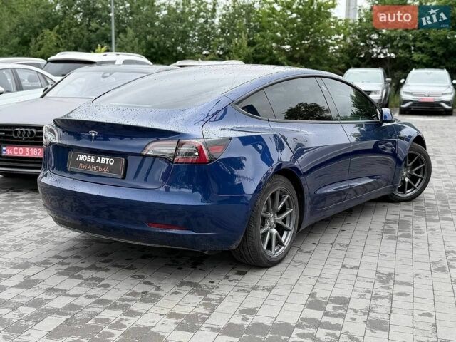 Синий Тесла Модель 3, объемом двигателя 0 л и пробегом 60 тыс. км за 15300 $, фото 2 на Automoto.ua