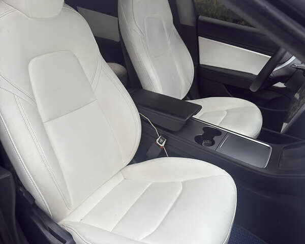 Синий Тесла Модель 3, объемом двигателя 0 л и пробегом 83 тыс. км за 19000 $, фото 8 на Automoto.ua