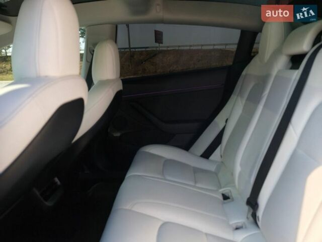 Синий Тесла Модель 3, объемом двигателя 0 л и пробегом 82 тыс. км за 20999 $, фото 20 на Automoto.ua