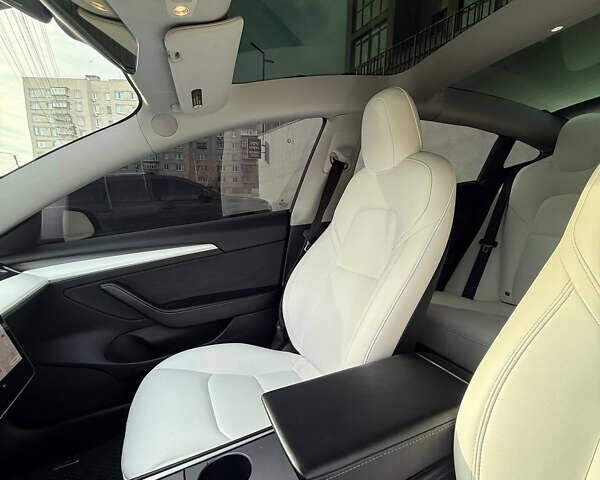 Синий Тесла Модель 3, объемом двигателя 0 л и пробегом 65 тыс. км за 21100 $, фото 10 на Automoto.ua