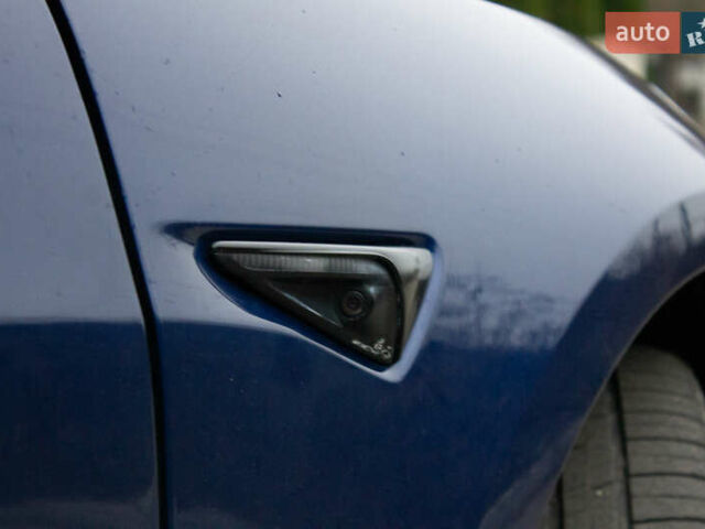 Синій Тесла Модель 3, об'ємом двигуна 0 л та пробігом 74 тис. км за 25700 $, фото 24 на Automoto.ua
