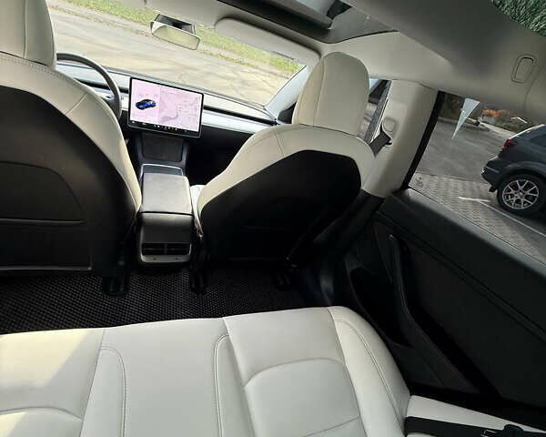 Синий Тесла Модель 3, объемом двигателя 0 л и пробегом 65 тыс. км за 21100 $, фото 4 на Automoto.ua