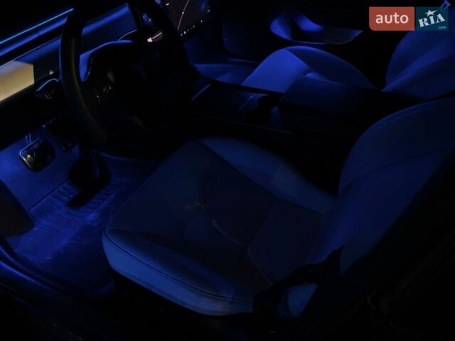 Синий Тесла Модель 3, объемом двигателя 0 л и пробегом 82 тыс. км за 20999 $, фото 24 на Automoto.ua