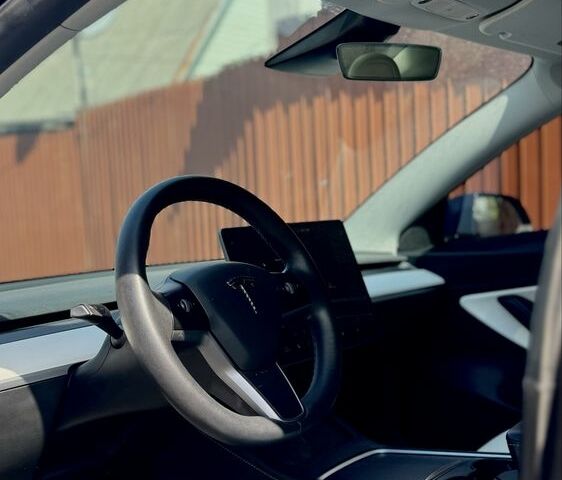 Синий Тесла Модель 3, объемом двигателя 0 л и пробегом 99 тыс. км за 23900 $, фото 4 на Automoto.ua