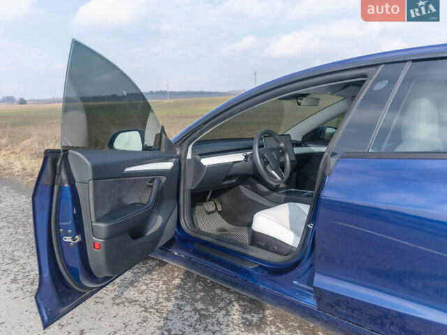Синий Тесла Модель 3, объемом двигателя 0 л и пробегом 28 тыс. км за 22999 $, фото 5 на Automoto.ua