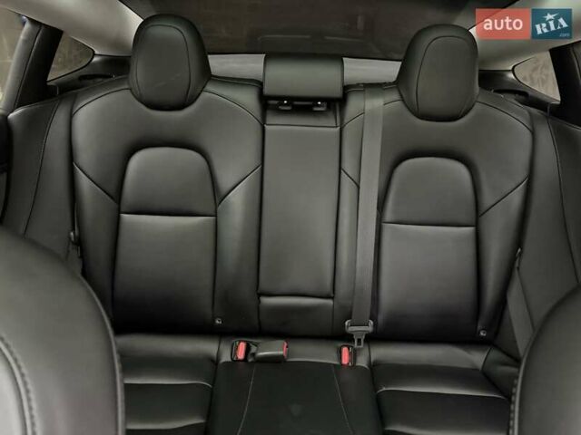 Тесла Модель 3 2022 у Умани на Automoto.ua Синій Тесла Модель 3, об'ємом двигуна 0 л та пробігом 53 тис. км за 19700 $, фото 29 на Automoto.ua