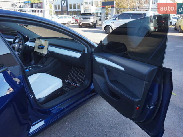 Синий Тесла Модель 3, объемом двигателя 0 л и пробегом 58 тыс. км за 22900 $, фото 29 на Automoto.ua