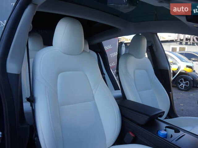 Синий Тесла Модель 3, объемом двигателя 0 л и пробегом 58 тыс. км за 22900 $, фото 32 на Automoto.ua