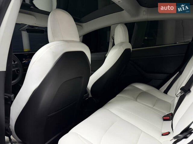 Синий Тесла Модель 3, объемом двигателя 0 л и пробегом 59 тыс. км за 20900 $, фото 21 на Automoto.ua