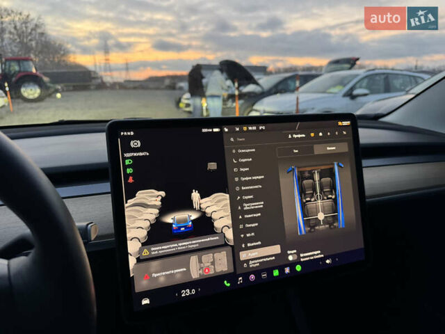 Синий Тесла Модель 3, объемом двигателя 0 л и пробегом 53 тыс. км за 19500 $, фото 26 на Automoto.ua