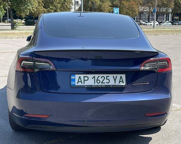 Синий Тесла Модель 3, объемом двигателя 0 л и пробегом 56 тыс. км за 26296 $, фото 4 на Automoto.ua