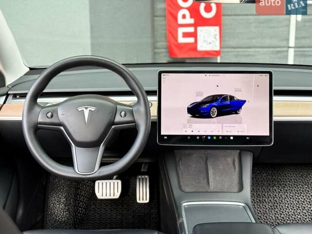 Синий Тесла Модель 3, объемом двигателя 0 л и пробегом 63 тыс. км за 25999 $, фото 17 на Automoto.ua