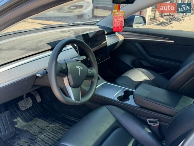Синий Тесла Модель 3, объемом двигателя 0 л и пробегом 73 тыс. км за 23700 $, фото 4 на Automoto.ua