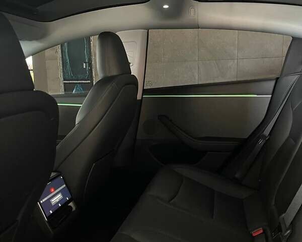 Зеленый Тесла Модель 3, объемом двигателя 0 л и пробегом 2 тыс. км за 29900 $, фото 11 на Automoto.ua
