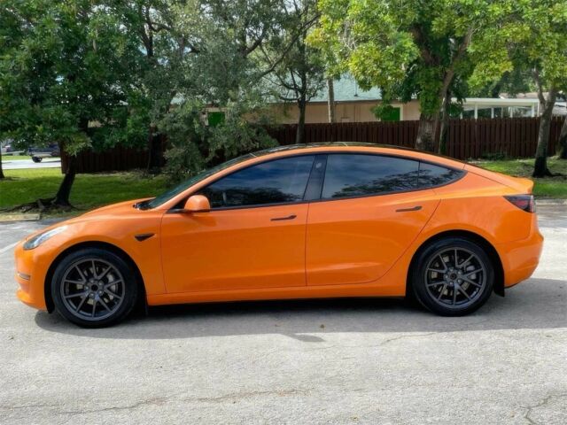 Помаранчевий Тесла Модель 3, об'ємом двигуна 0 л та пробігом 16 тис. км за 11300 $, фото 2 на Automoto.ua