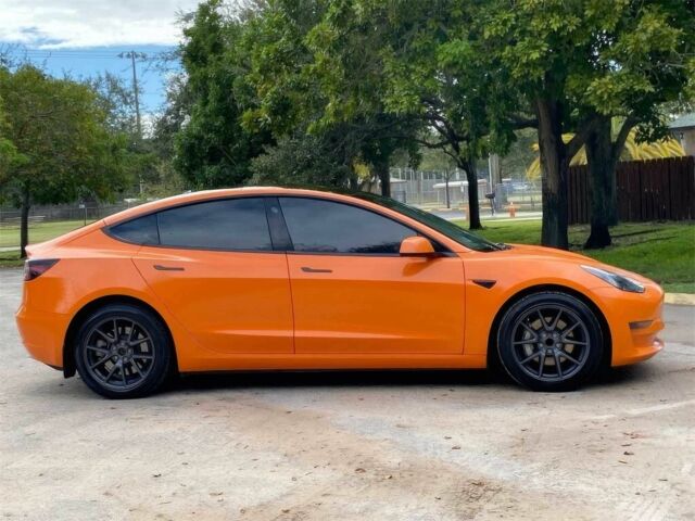 Помаранчевий Тесла Модель 3, об'ємом двигуна 0 л та пробігом 16 тис. км за 11300 $, фото 6 на Automoto.ua
