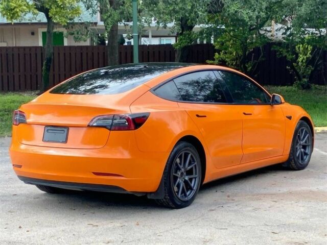 Помаранчевий Тесла Модель 3, об'ємом двигуна 0 л та пробігом 16 тис. км за 11300 $, фото 5 на Automoto.ua