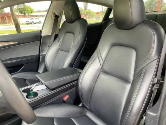 Помаранчевий Тесла Модель 3, об'ємом двигуна 0 л та пробігом 16 тис. км за 11300 $, фото 14 на Automoto.ua