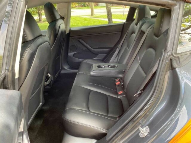 Помаранчевий Тесла Модель 3, об'ємом двигуна 0 л та пробігом 16 тис. км за 11300 $, фото 16 на Automoto.ua