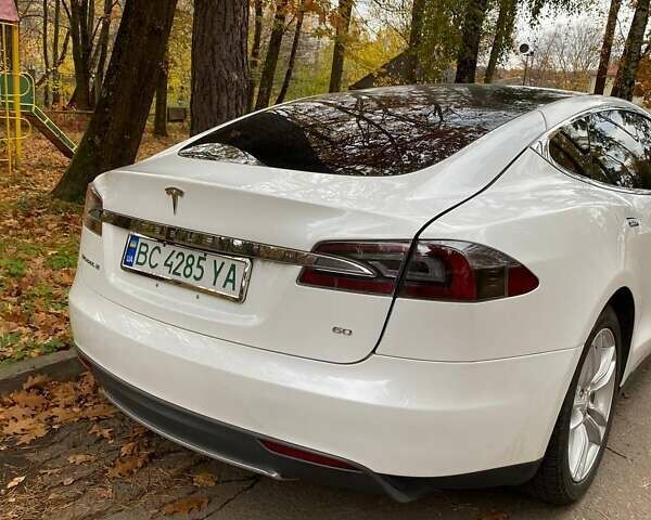 Білий Тесла Модель С, об'ємом двигуна 0 л та пробігом 98 тис. км за 13000 $, фото 2 на Automoto.ua