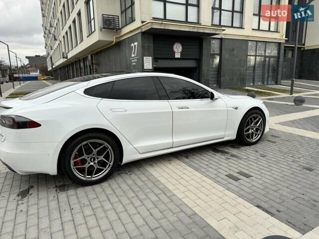 Белый Тесла Модель С, объемом двигателя 0 л и пробегом 272 тыс. км за 22500 $, фото 3 на Automoto.ua