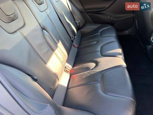 Білий Тесла Модель С, об'ємом двигуна 0 л та пробігом 170 тис. км за 12300 $, фото 12 на Automoto.ua