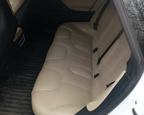 Белый Тесла Модель С, объемом двигателя 0 л и пробегом 136 тыс. км за 14900 $, фото 5 на Automoto.ua